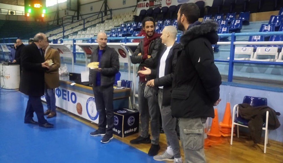 A generic square placeholder image with rounded corners in a figure.