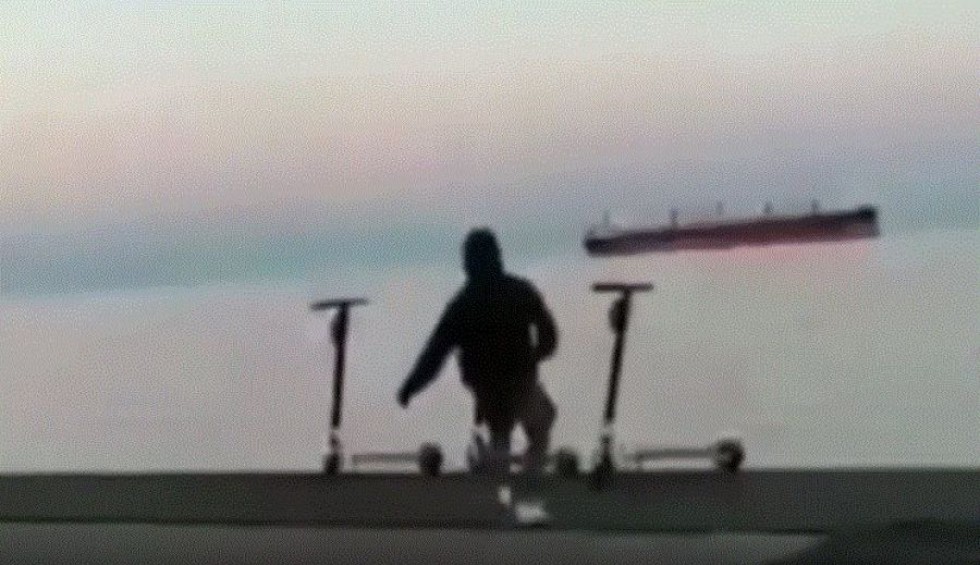 A generic square placeholder image with rounded corners in a figure.