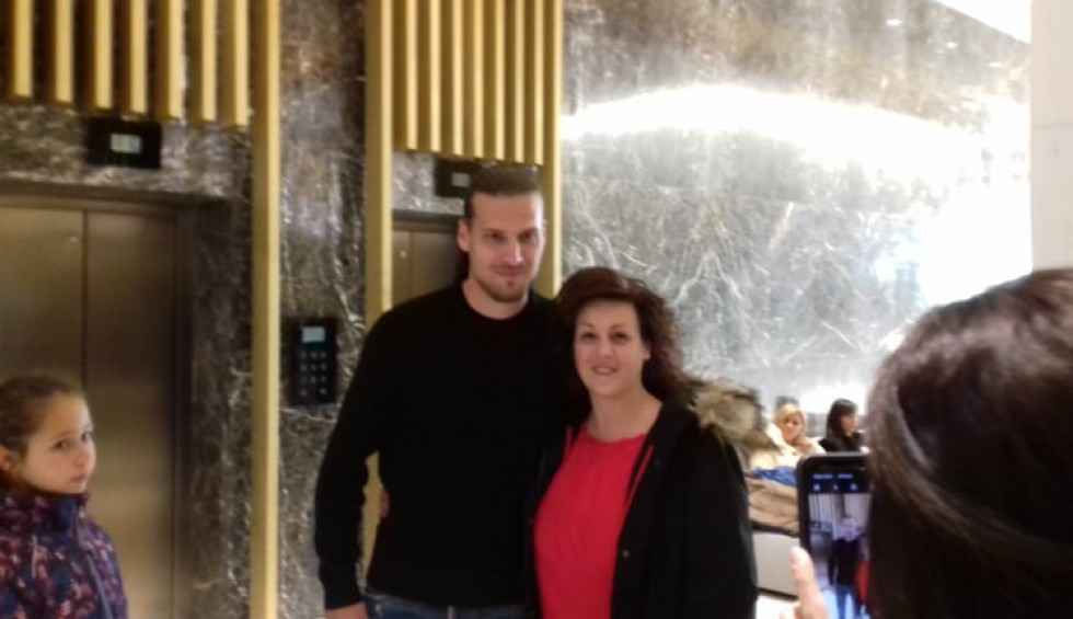 A generic square placeholder image with rounded corners in a figure.