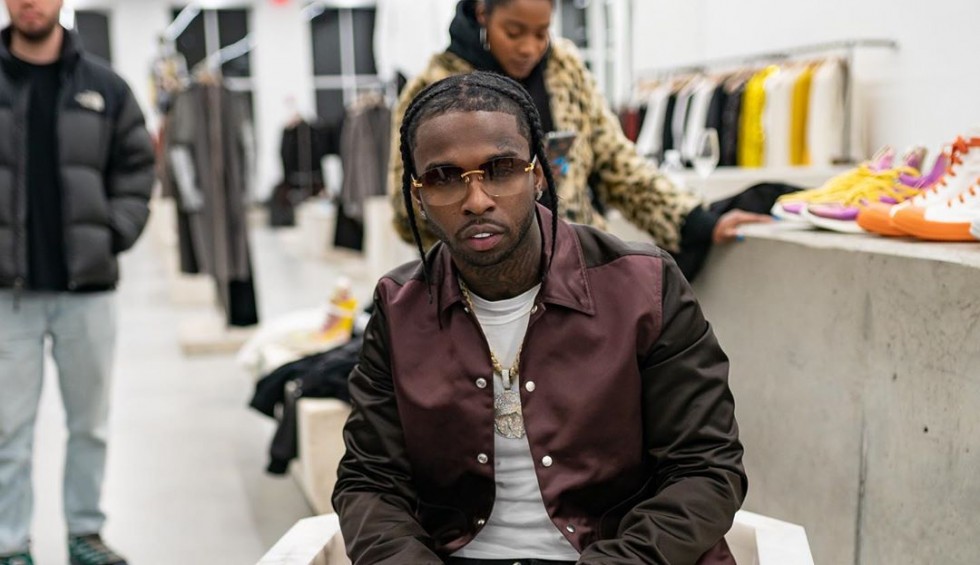 A generic square placeholder image with rounded corners in a figure.