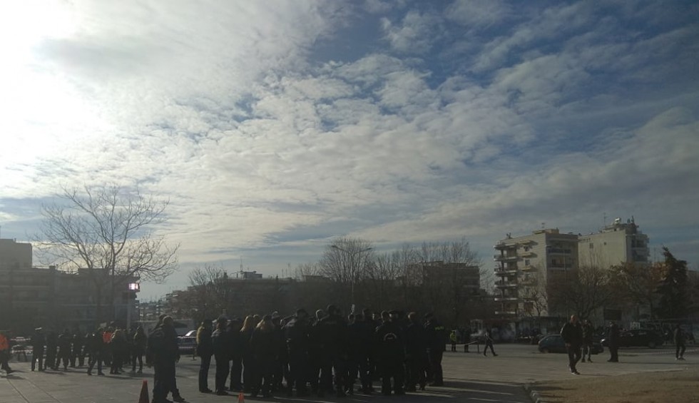 A generic square placeholder image with rounded corners in a figure.