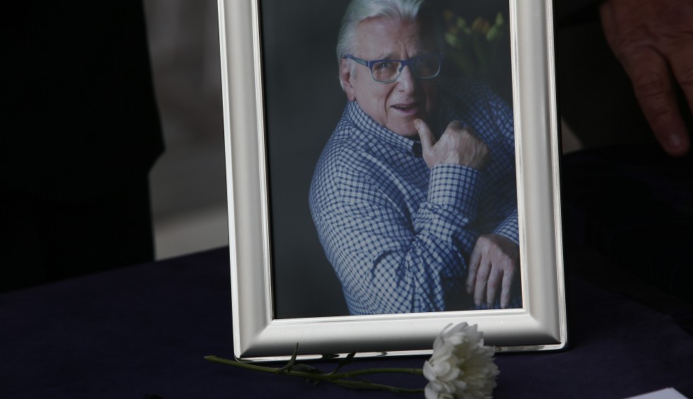 A generic square placeholder image with rounded corners in a figure.