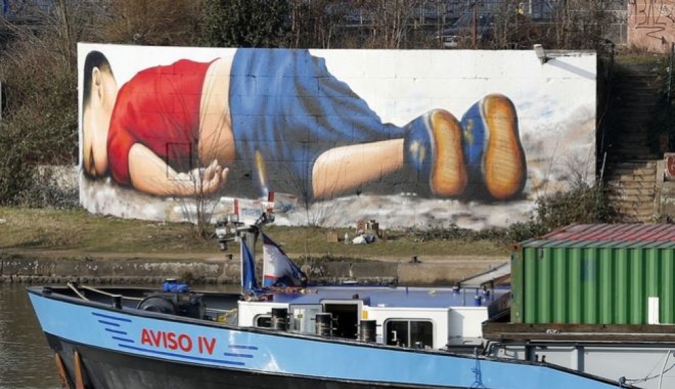 A generic square placeholder image with rounded corners in a figure.