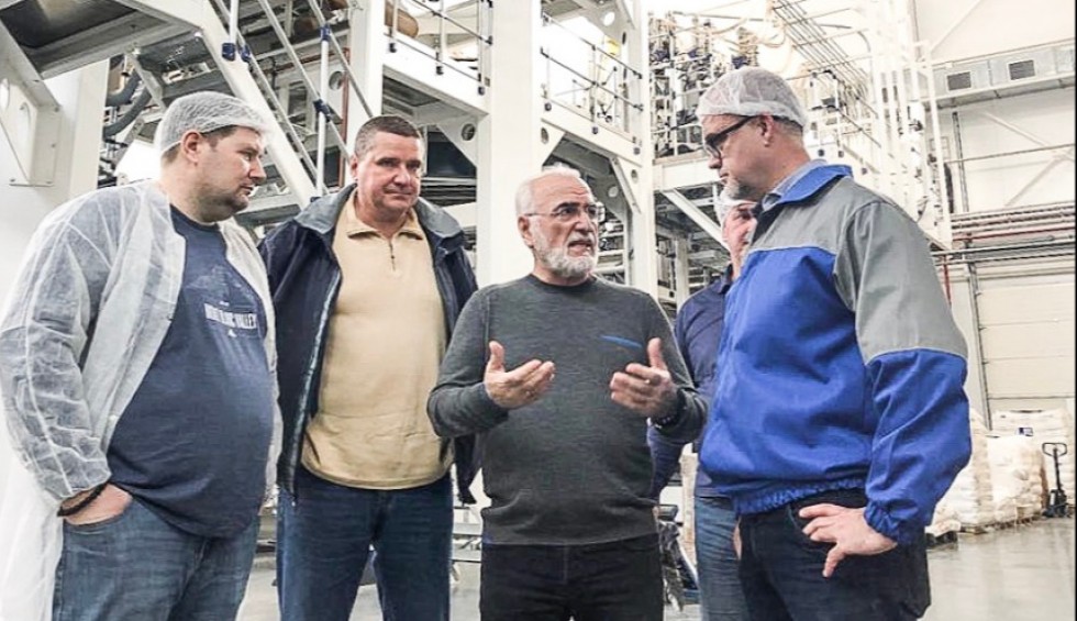 A generic square placeholder image with rounded corners in a figure.