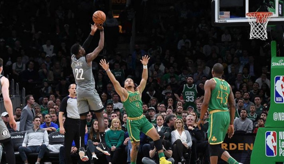 A generic square placeholder image with rounded corners in a figure.