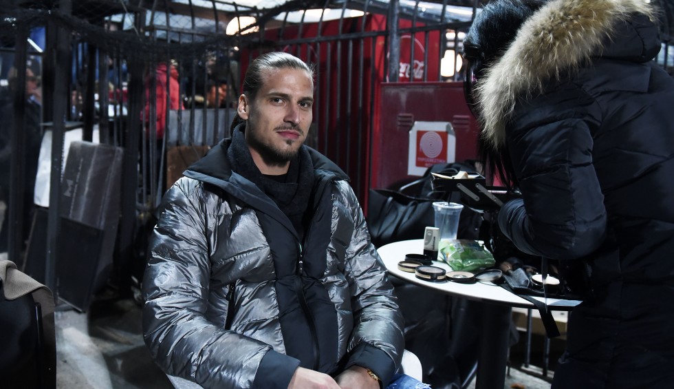 A generic square placeholder image with rounded corners in a figure.