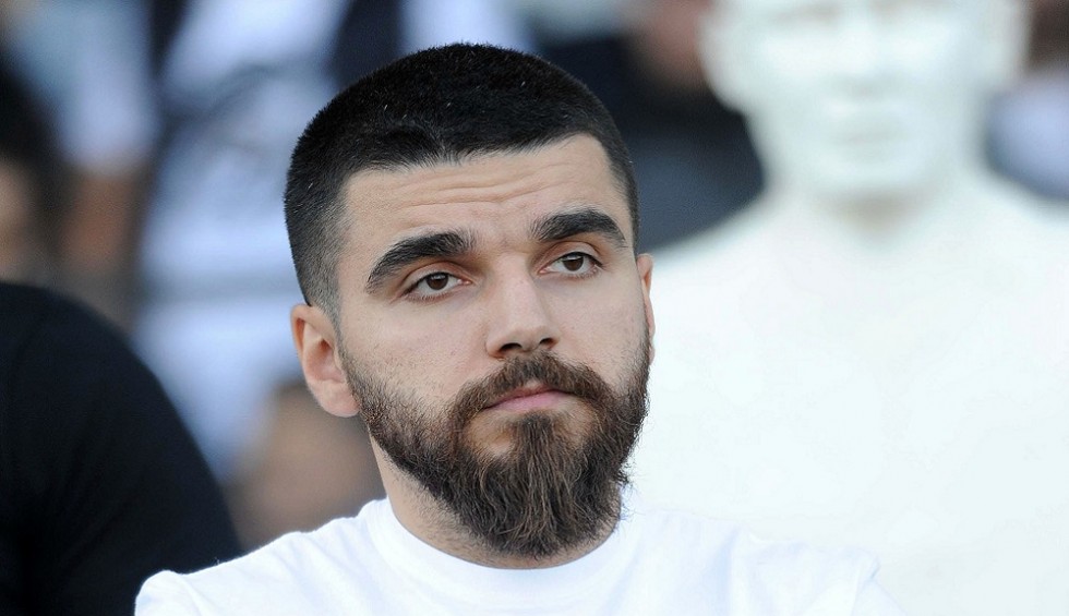 A generic square placeholder image with rounded corners in a figure.