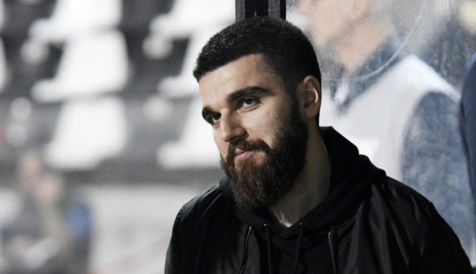 A generic square placeholder image with rounded corners in a figure.