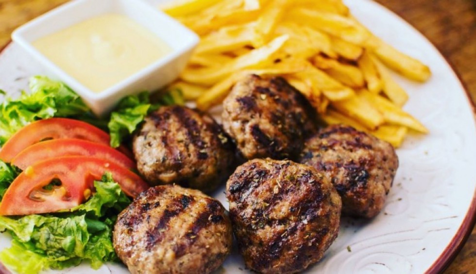 A generic square placeholder image with rounded corners in a figure.