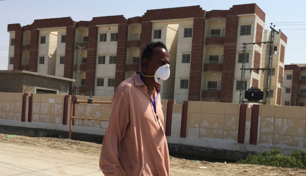 A generic square placeholder image with rounded corners in a figure.