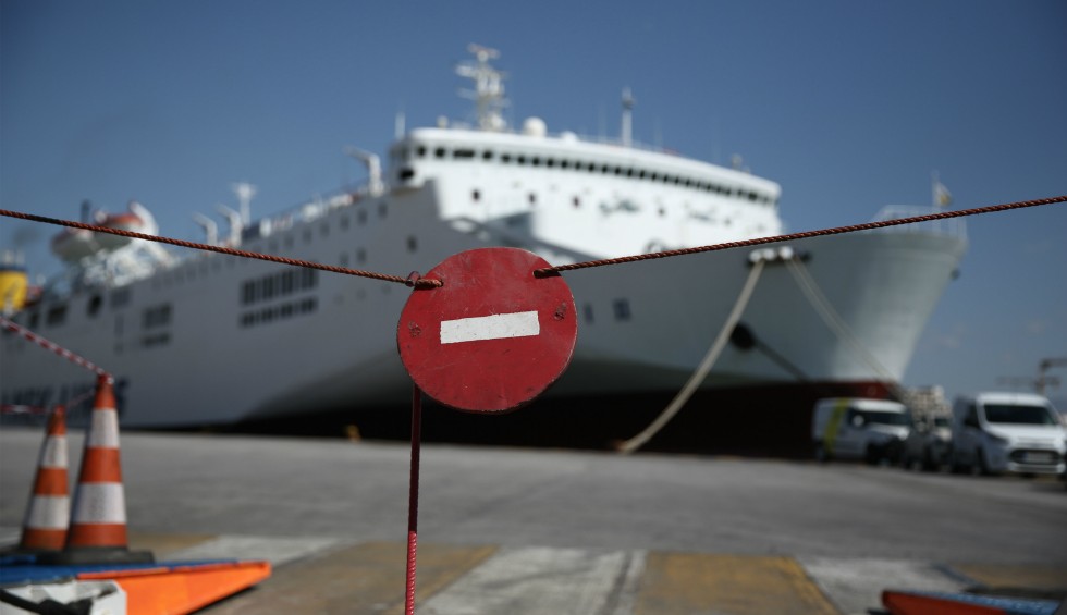 A generic square placeholder image with rounded corners in a figure.