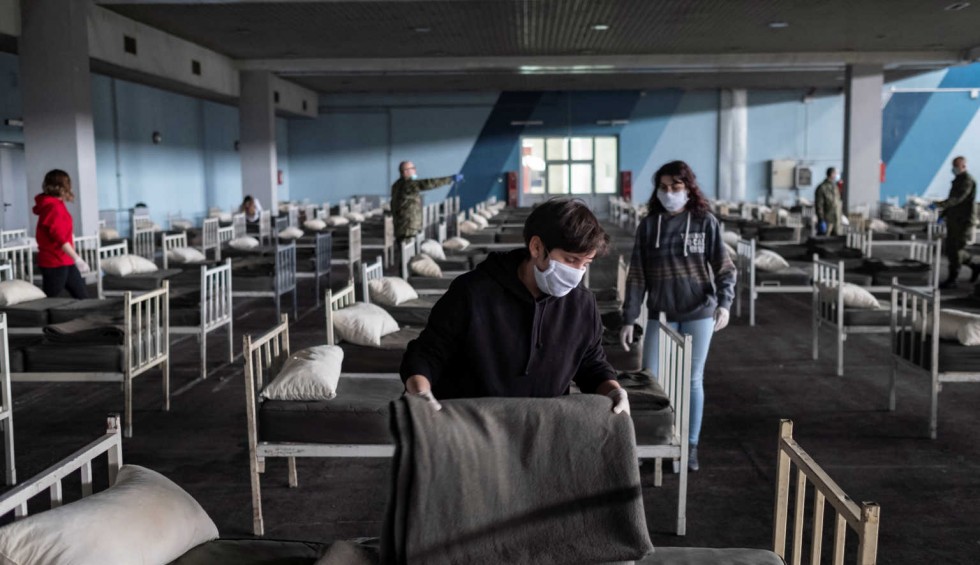 A generic square placeholder image with rounded corners in a figure.