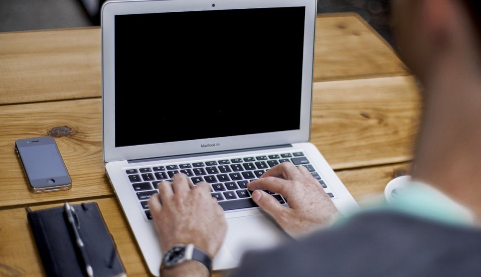 A generic square placeholder image with rounded corners in a figure.