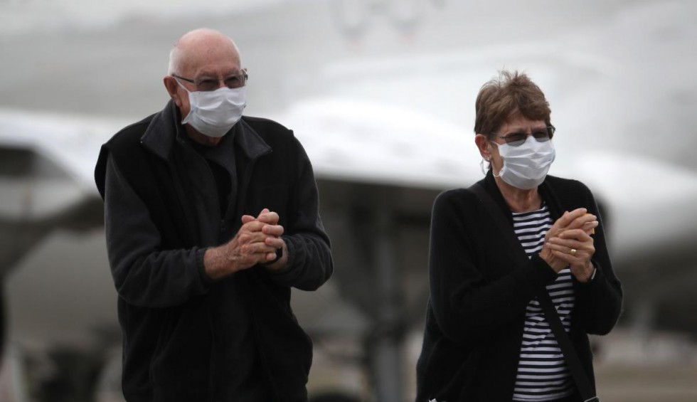 A generic square placeholder image with rounded corners in a figure.