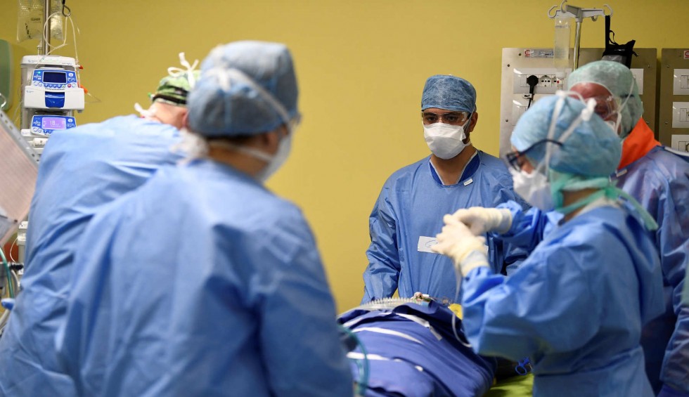 A generic square placeholder image with rounded corners in a figure.