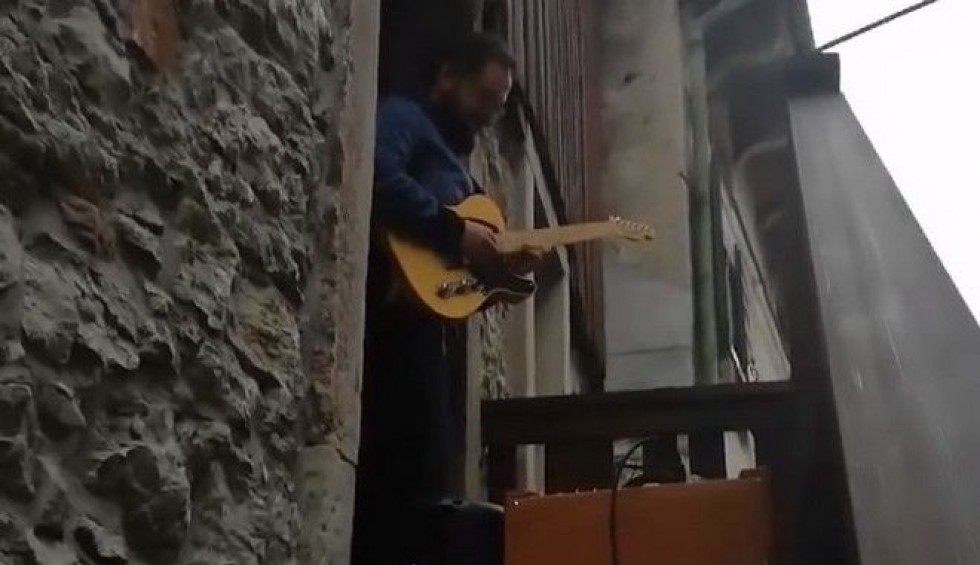 A generic square placeholder image with rounded corners in a figure.