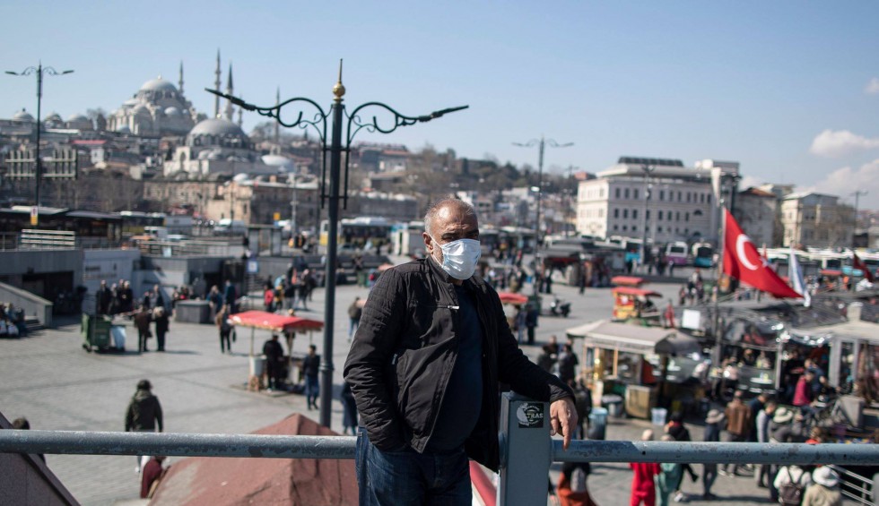 A generic square placeholder image with rounded corners in a figure.