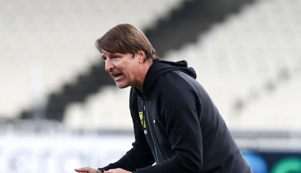 A generic square placeholder image with rounded corners in a figure.