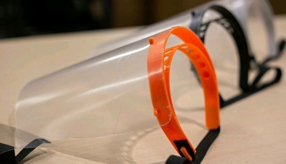 A generic square placeholder image with rounded corners in a figure.