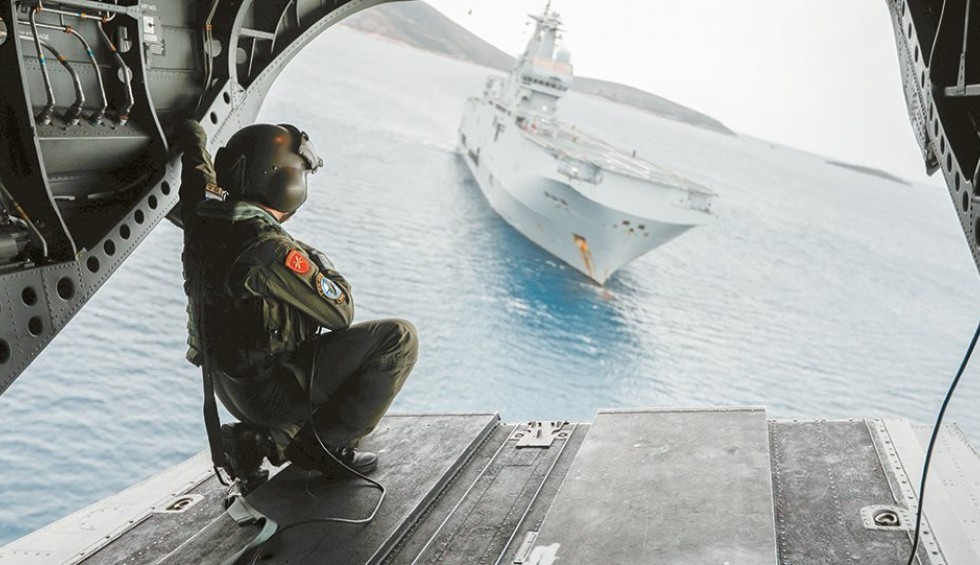 A generic square placeholder image with rounded corners in a figure.