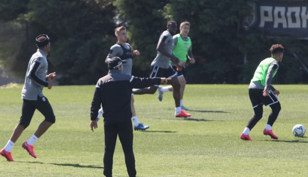 A generic square placeholder image with rounded corners in a figure.