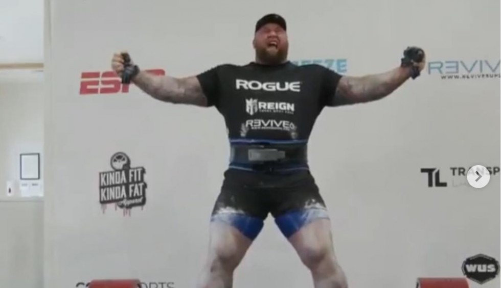 A generic square placeholder image with rounded corners in a figure.