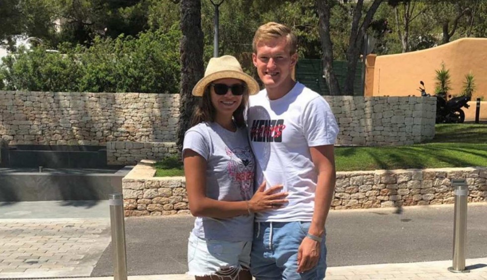 A generic square placeholder image with rounded corners in a figure.