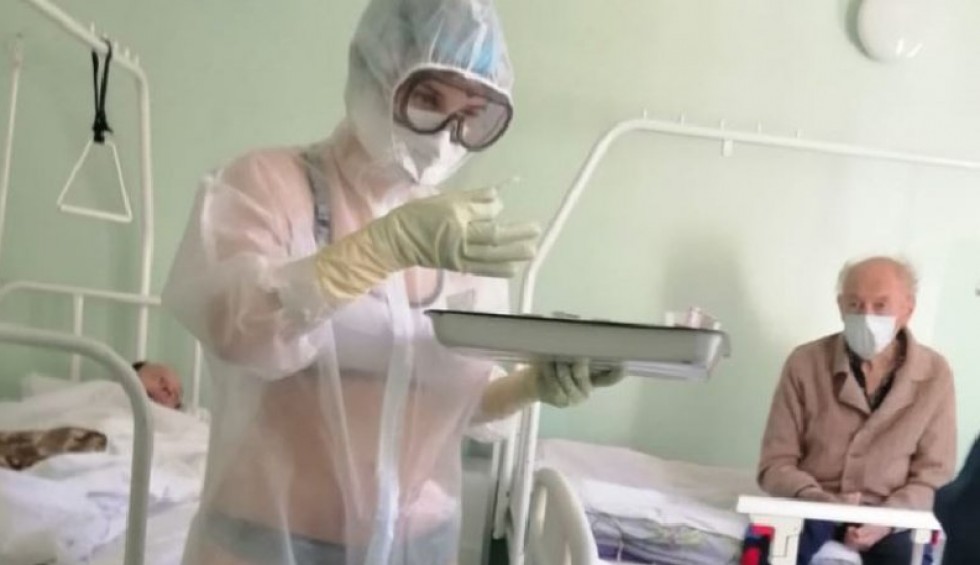 A generic square placeholder image with rounded corners in a figure.