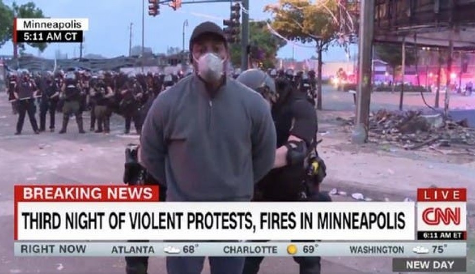 A generic square placeholder image with rounded corners in a figure.