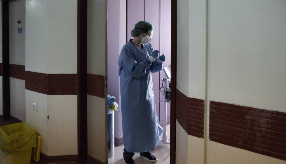 A generic square placeholder image with rounded corners in a figure.