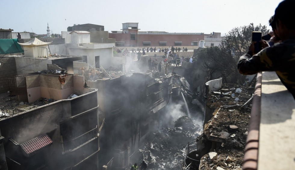 A generic square placeholder image with rounded corners in a figure.