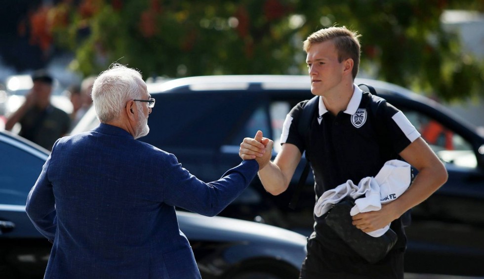 A generic square placeholder image with rounded corners in a figure.