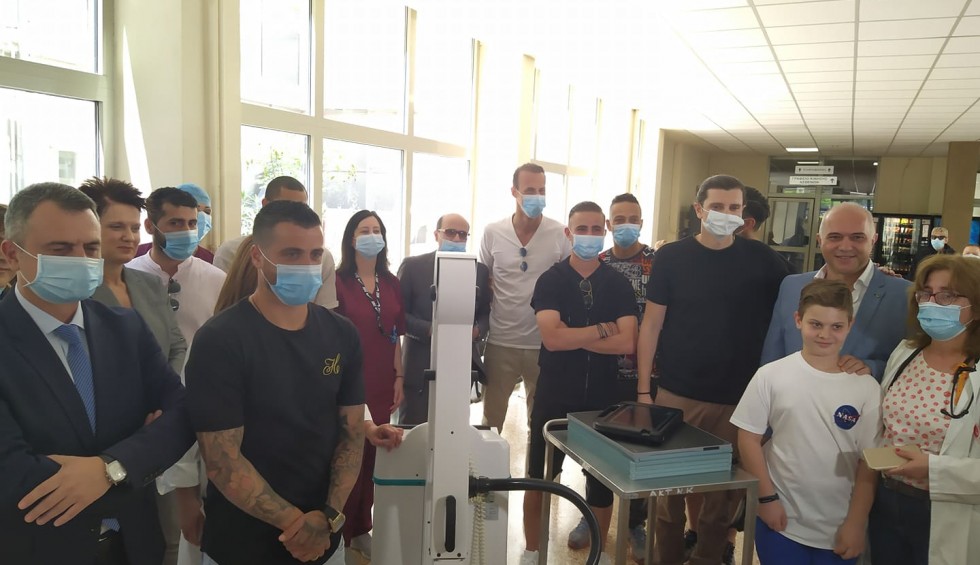 A generic square placeholder image with rounded corners in a figure.