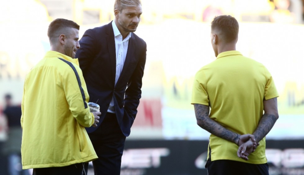 A generic square placeholder image with rounded corners in a figure.