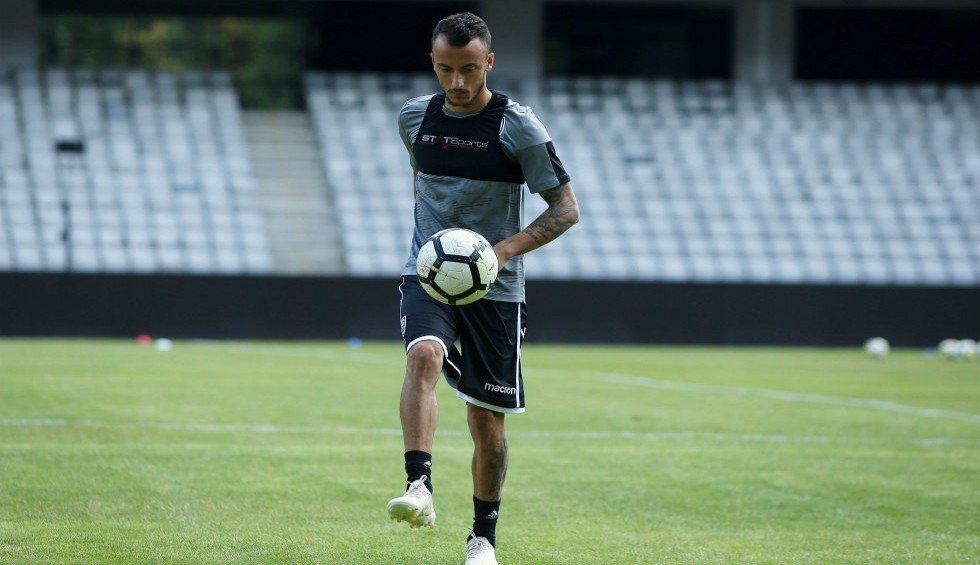 A generic square placeholder image with rounded corners in a figure.