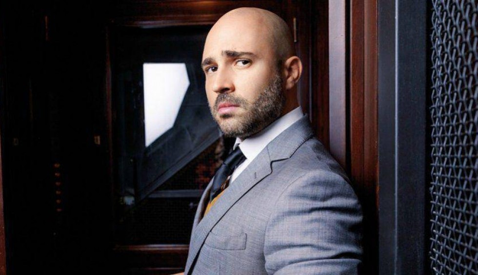 A generic square placeholder image with rounded corners in a figure.