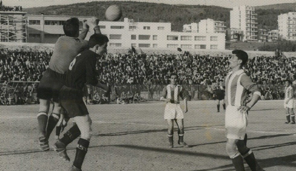 A generic square placeholder image with rounded corners in a figure.