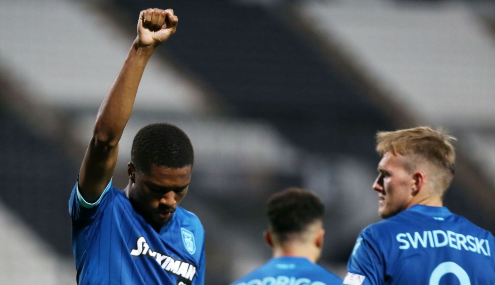 A generic square placeholder image with rounded corners in a figure.