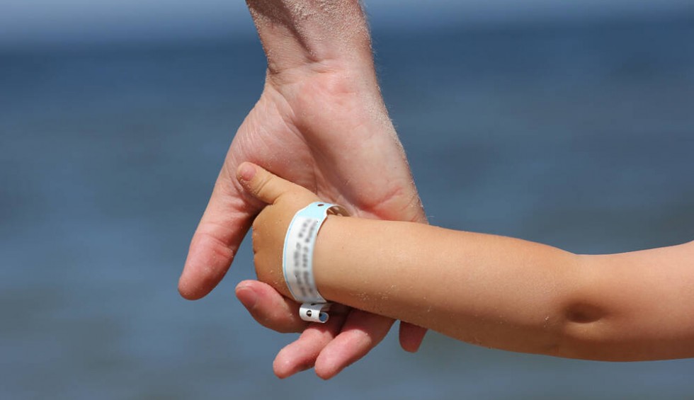 A generic square placeholder image with rounded corners in a figure.