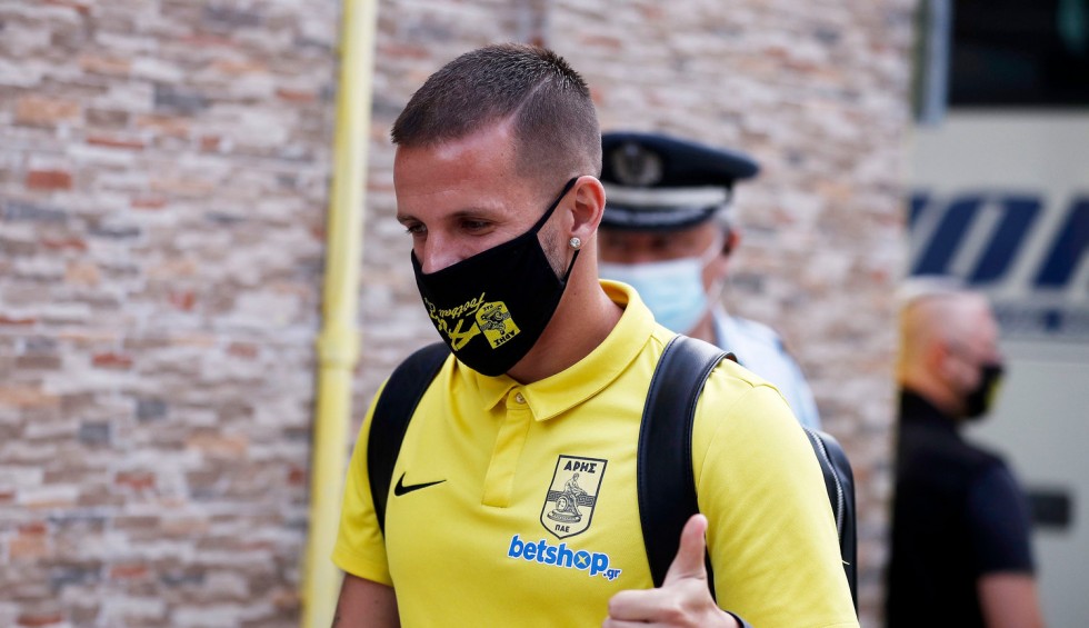 A generic square placeholder image with rounded corners in a figure.