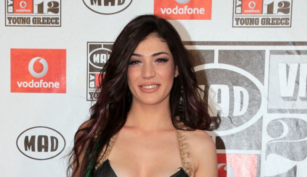 A generic square placeholder image with rounded corners in a figure.