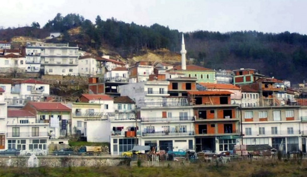 A generic square placeholder image with rounded corners in a figure.