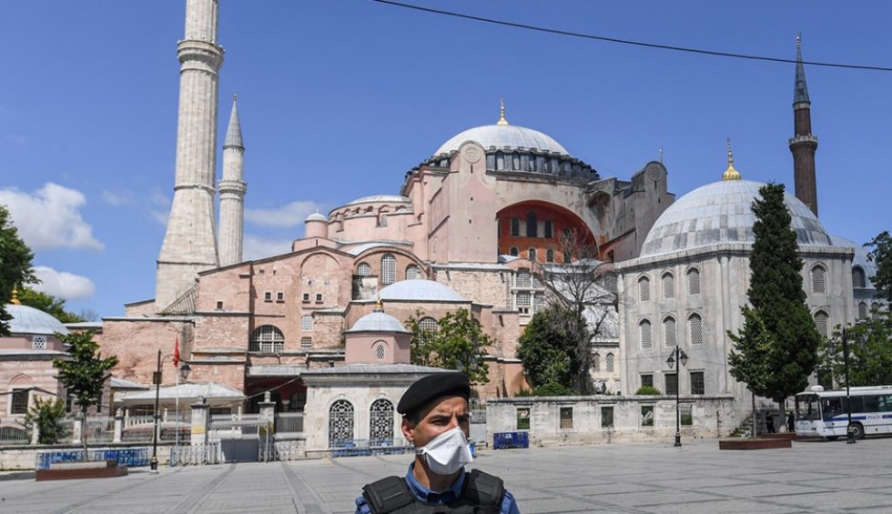 A generic square placeholder image with rounded corners in a figure.