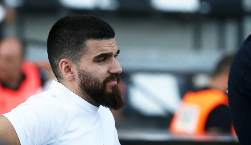 A generic square placeholder image with rounded corners in a figure.