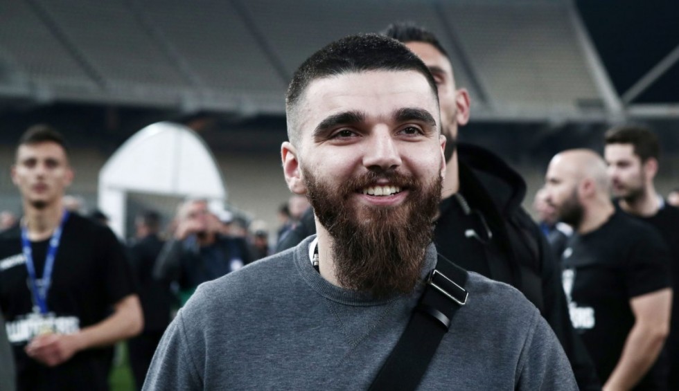 A generic square placeholder image with rounded corners in a figure.