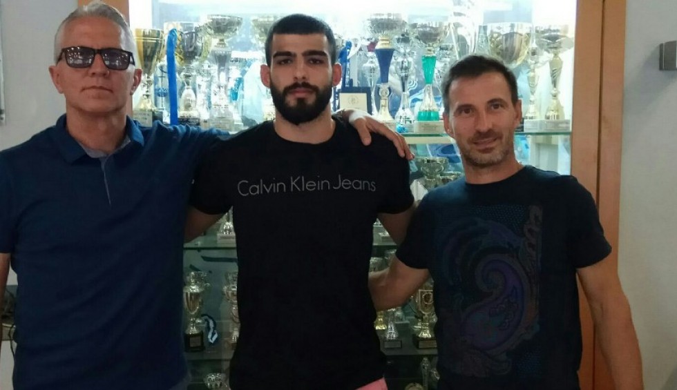 A generic square placeholder image with rounded corners in a figure.