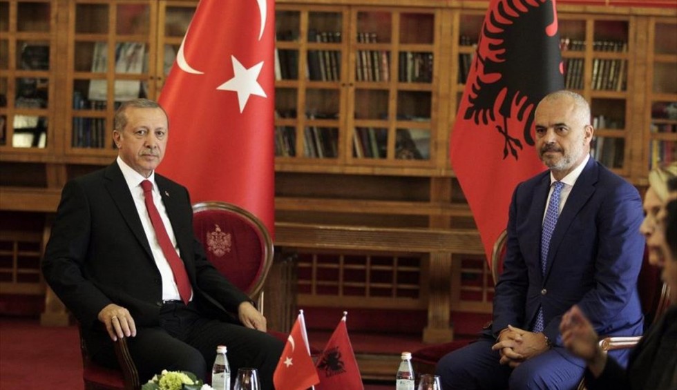 A generic square placeholder image with rounded corners in a figure.