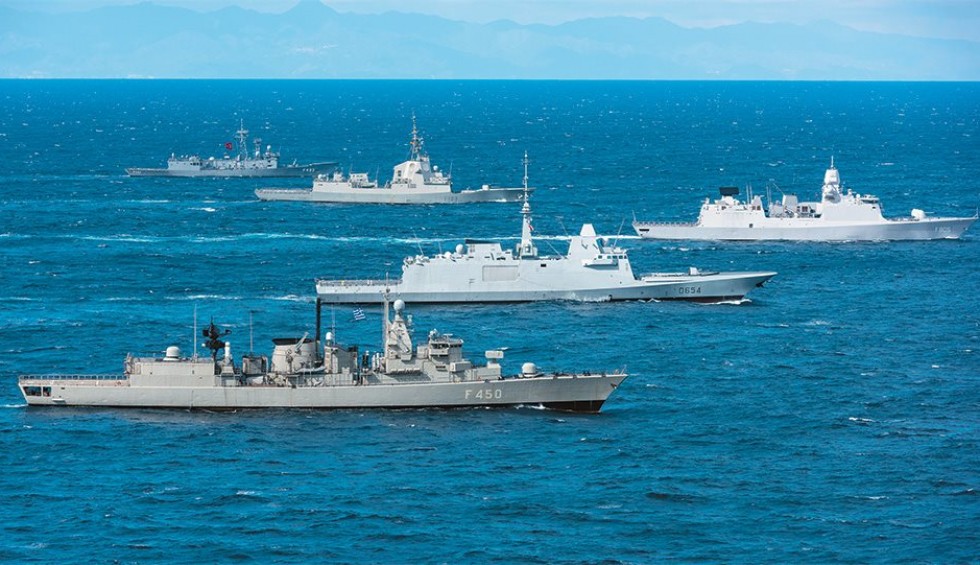 A generic square placeholder image with rounded corners in a figure.