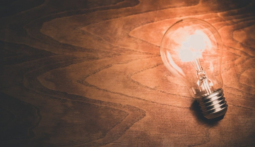 A generic square placeholder image with rounded corners in a figure.