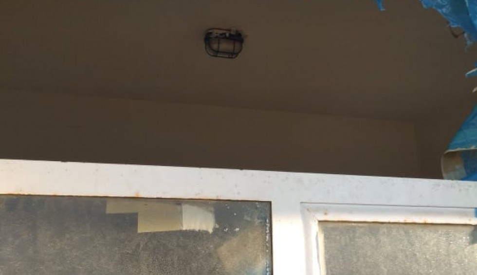 A generic square placeholder image with rounded corners in a figure.